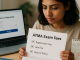 A candidate checks an ATMA exam-fee checklist and registration deadline while preparing to pay