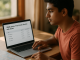 A student compares ATMA test-centre locations and travel costs at a desk.